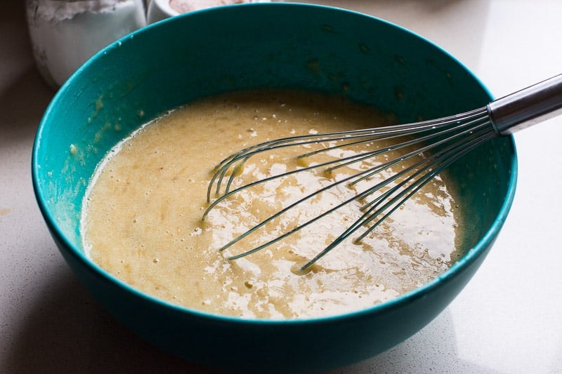 Whisk in a bowl of raw muffin batter. 