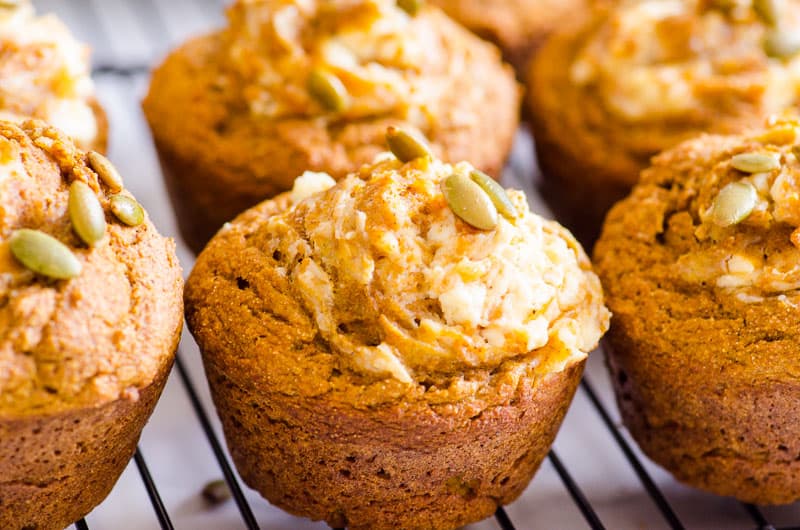Healthy pumpkin muffins on baking rack.
